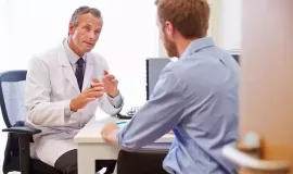 doctor speaking to patient
