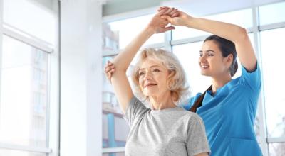 older female patient receiving Physical Therapy